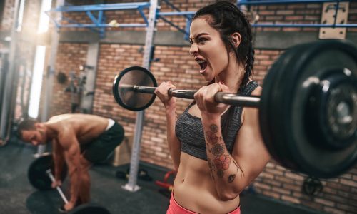 fit-couple-lifting-barbells-in-the-gym-ZACL9S6.jpg